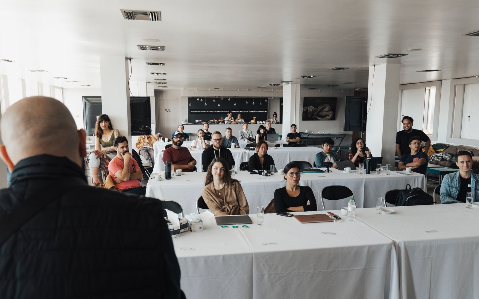 Professionals attending a training presentation